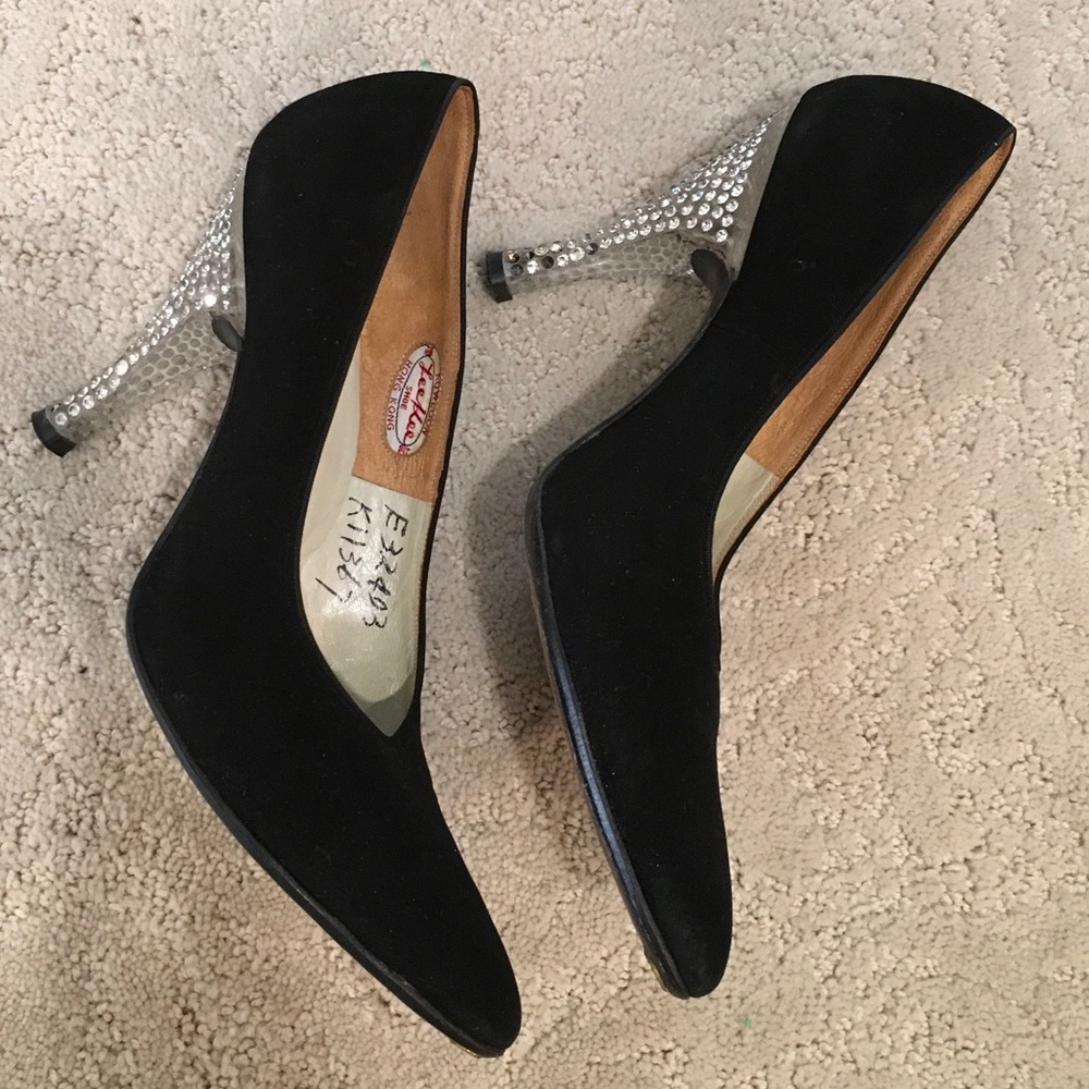 Black pumps with clear jewel studded heel